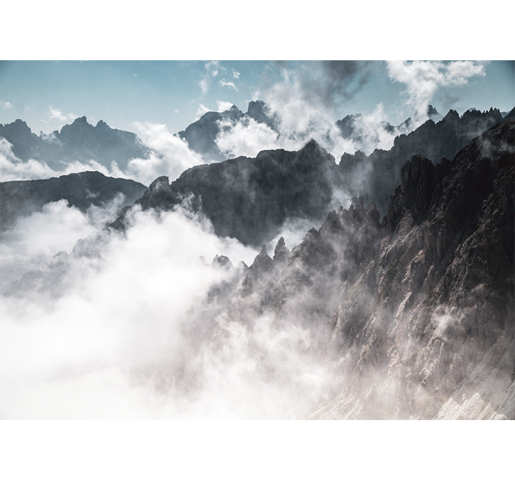 Fototapeta zasněžené hory nad mraky - TenStickers