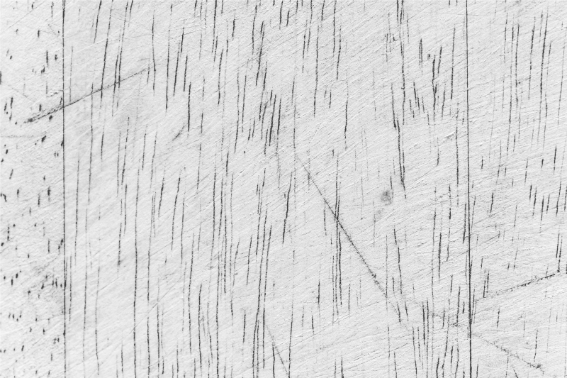 Koberec do ložnice s efektem poškrábané stěny - TenStickers