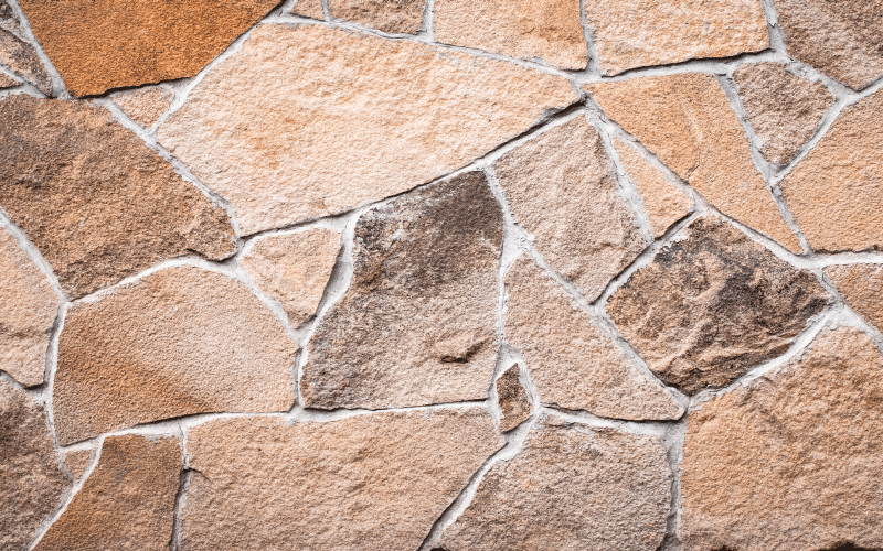 Světle hnědý nepravidelný koberec s texturou koberce - TenStickers